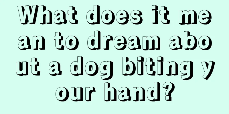 What does it mean to dream about a dog biting your hand?