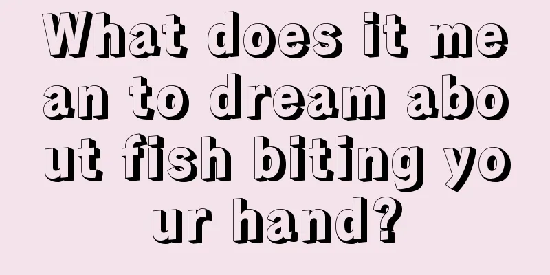 What does it mean to dream about fish biting your hand?