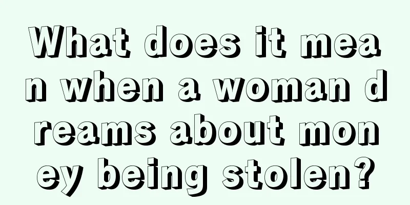 What does it mean when a woman dreams about money being stolen?