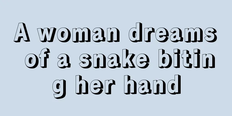 A woman dreams of a snake biting her hand