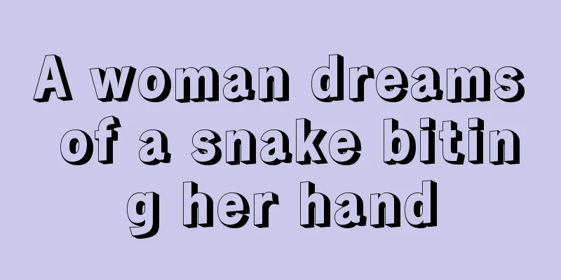 A woman dreams of a snake biting her hand