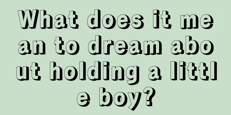 What does it mean to dream about holding a little boy?