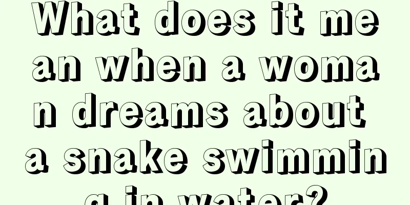 What does it mean when a woman dreams about a snake swimming in water?