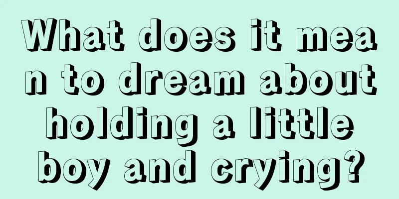 What does it mean to dream about holding a little boy and crying?