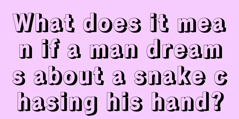 What does it mean if a man dreams about a snake chasing his hand?