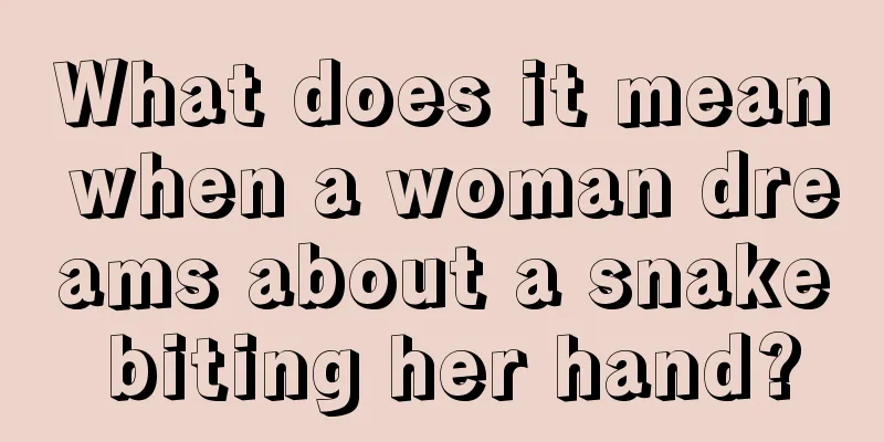 What does it mean when a woman dreams about a snake biting her hand?