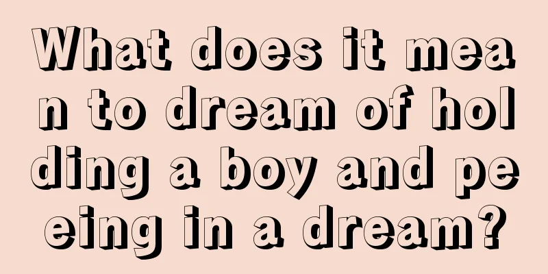 What does it mean to dream of holding a boy and peeing in a dream?