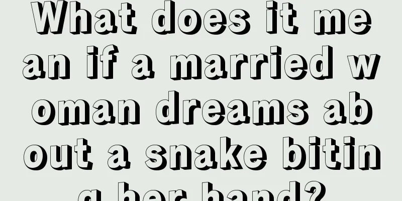 What does it mean if a married woman dreams about a snake biting her hand?