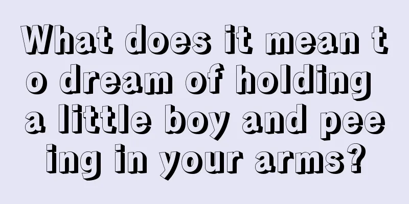 What does it mean to dream of holding a little boy and peeing in your arms?