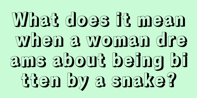 What does it mean when a woman dreams about being bitten by a snake?