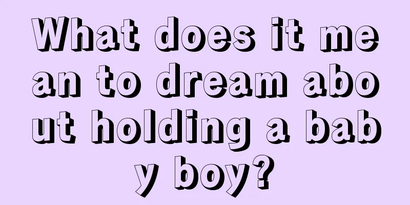 What does it mean to dream about holding a baby boy?