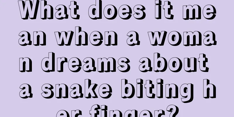 What does it mean when a woman dreams about a snake biting her finger?