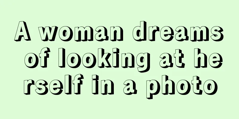 A woman dreams of looking at herself in a photo