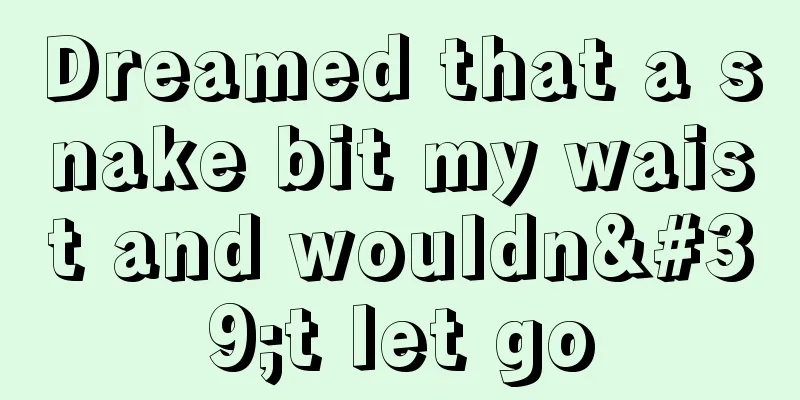 Dreamed that a snake bit my waist and wouldn't let go