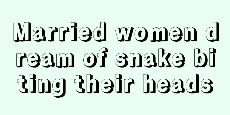 Married women dream of snake biting their heads