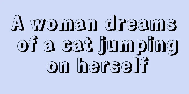 A woman dreams of a cat jumping on herself