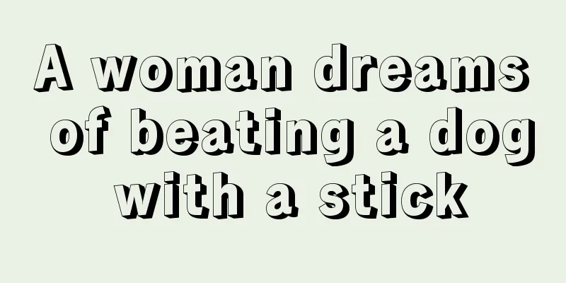 A woman dreams of beating a dog with a stick