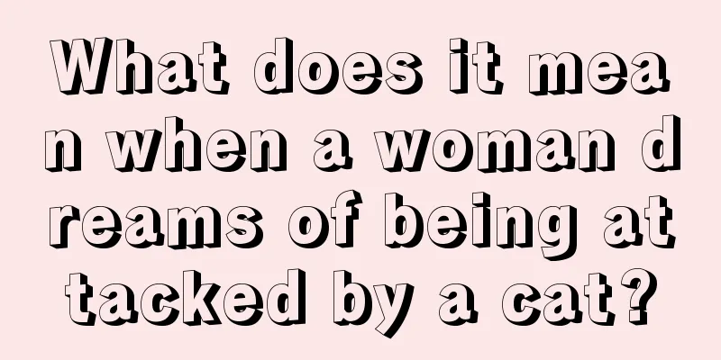 What does it mean when a woman dreams of being attacked by a cat?