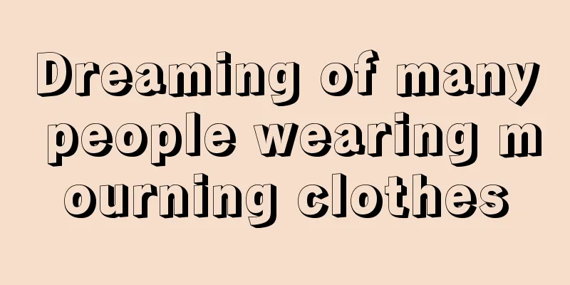 Dreaming of many people wearing mourning clothes