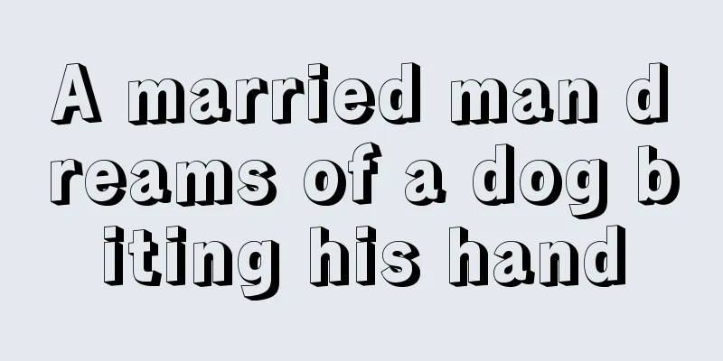 A married man dreams of a dog biting his hand