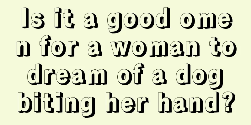 Is it a good omen for a woman to dream of a dog biting her hand?