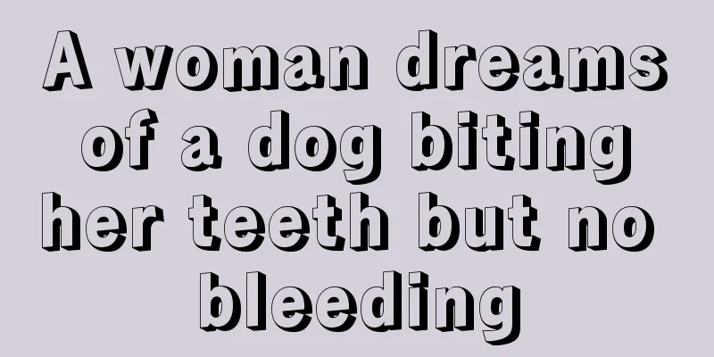 A woman dreams of a dog biting her teeth but no bleeding