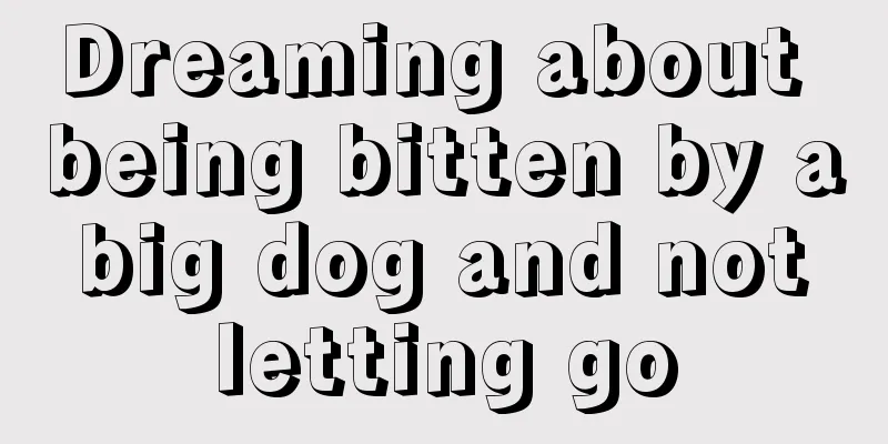 Dreaming about being bitten by a big dog and not letting go