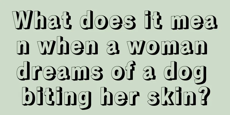 What does it mean when a woman dreams of a dog biting her skin?