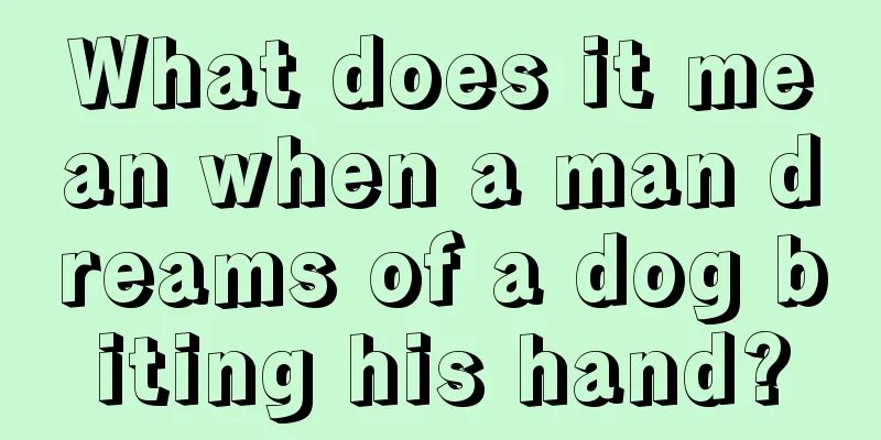 What does it mean when a man dreams of a dog biting his hand?