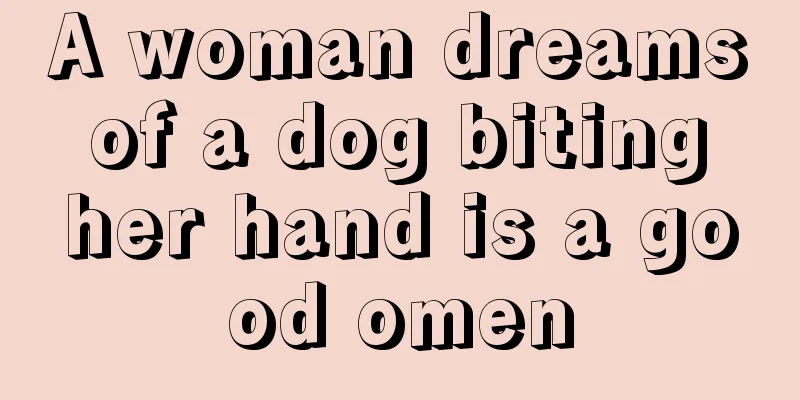 A woman dreams of a dog biting her hand is a good omen