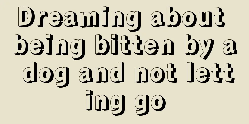 Dreaming about being bitten by a dog and not letting go