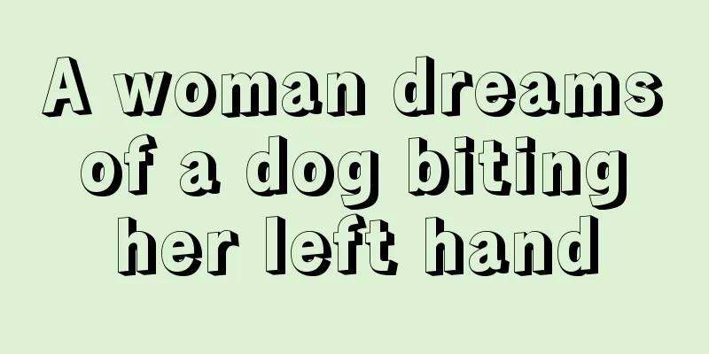 A woman dreams of a dog biting her left hand