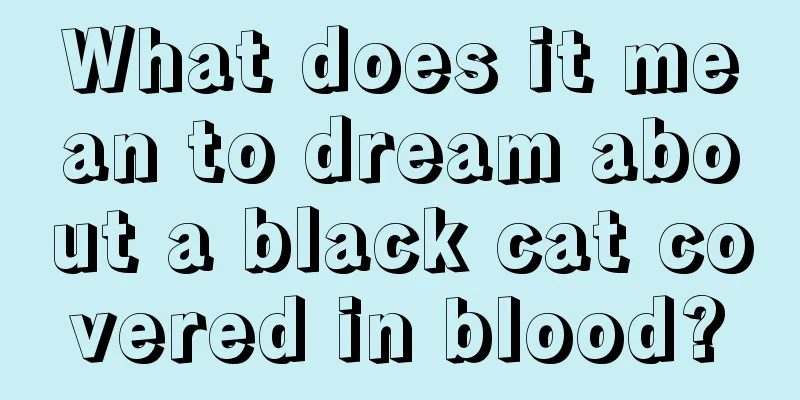 What does it mean to dream about a black cat covered in blood?