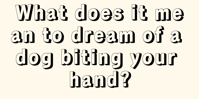 What does it mean to dream of a dog biting your hand?