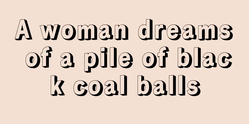 A woman dreams of a pile of black coal balls