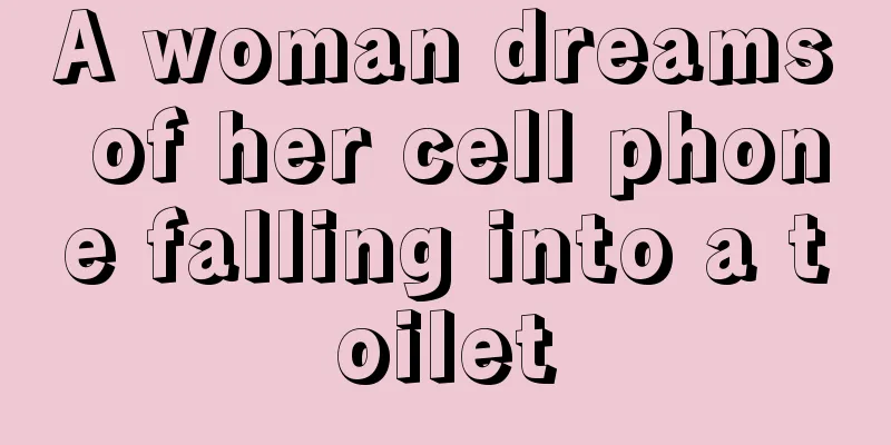 A woman dreams of her cell phone falling into a toilet