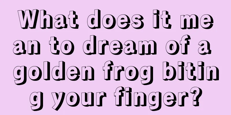 What does it mean to dream of a golden frog biting your finger?