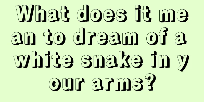 What does it mean to dream of a white snake in your arms?