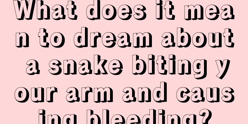 What does it mean to dream about a snake biting your arm and causing bleeding?