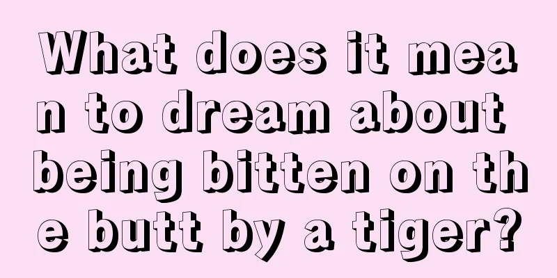 What does it mean to dream about being bitten on the butt by a tiger?