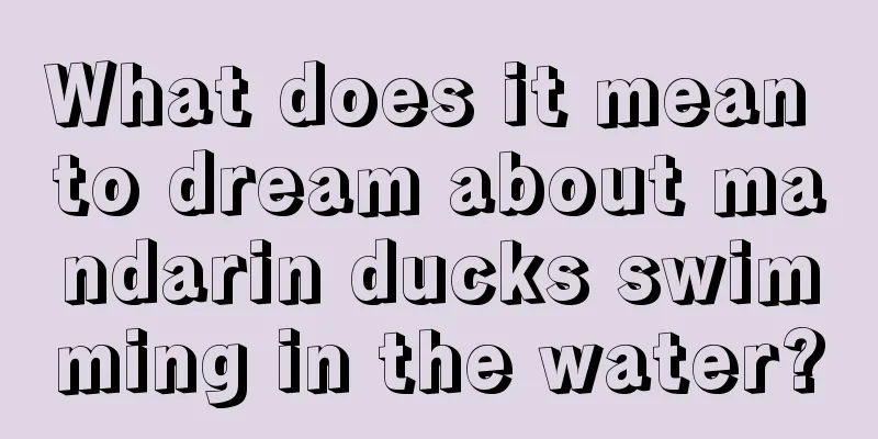 What does it mean to dream about mandarin ducks swimming in the water?