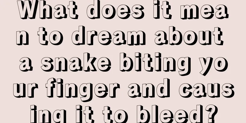 What does it mean to dream about a snake biting your finger and causing it to bleed?