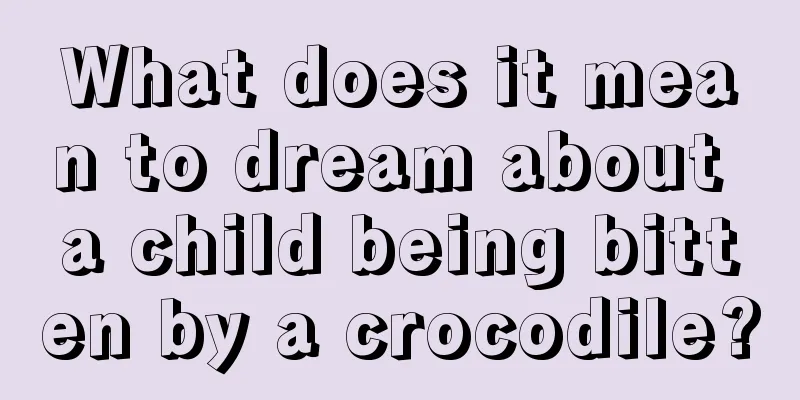 What does it mean to dream about a child being bitten by a crocodile?