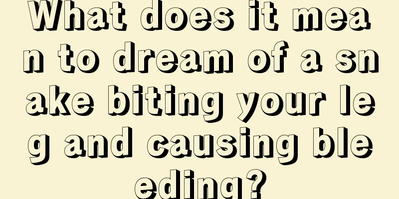 What does it mean to dream of a snake biting your leg and causing bleeding?