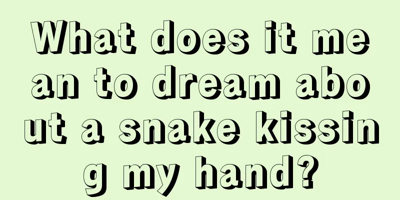 What does it mean to dream about a snake kissing my hand?