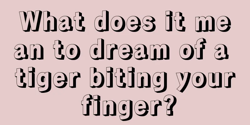 What does it mean to dream of a tiger biting your finger?