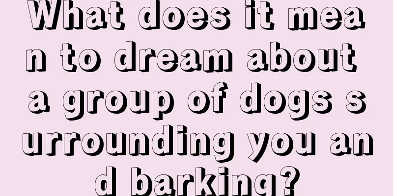 What does it mean to dream about a group of dogs surrounding you and barking?