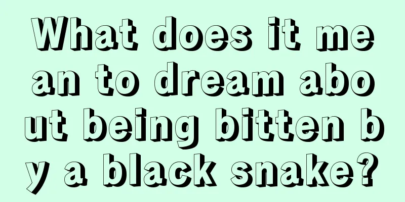 What does it mean to dream about being bitten by a black snake?