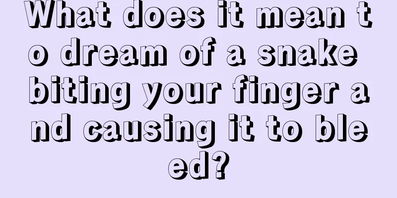 What does it mean to dream of a snake biting your finger and causing it to bleed?