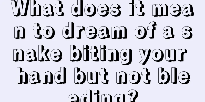 What does it mean to dream of a snake biting your hand but not bleeding?